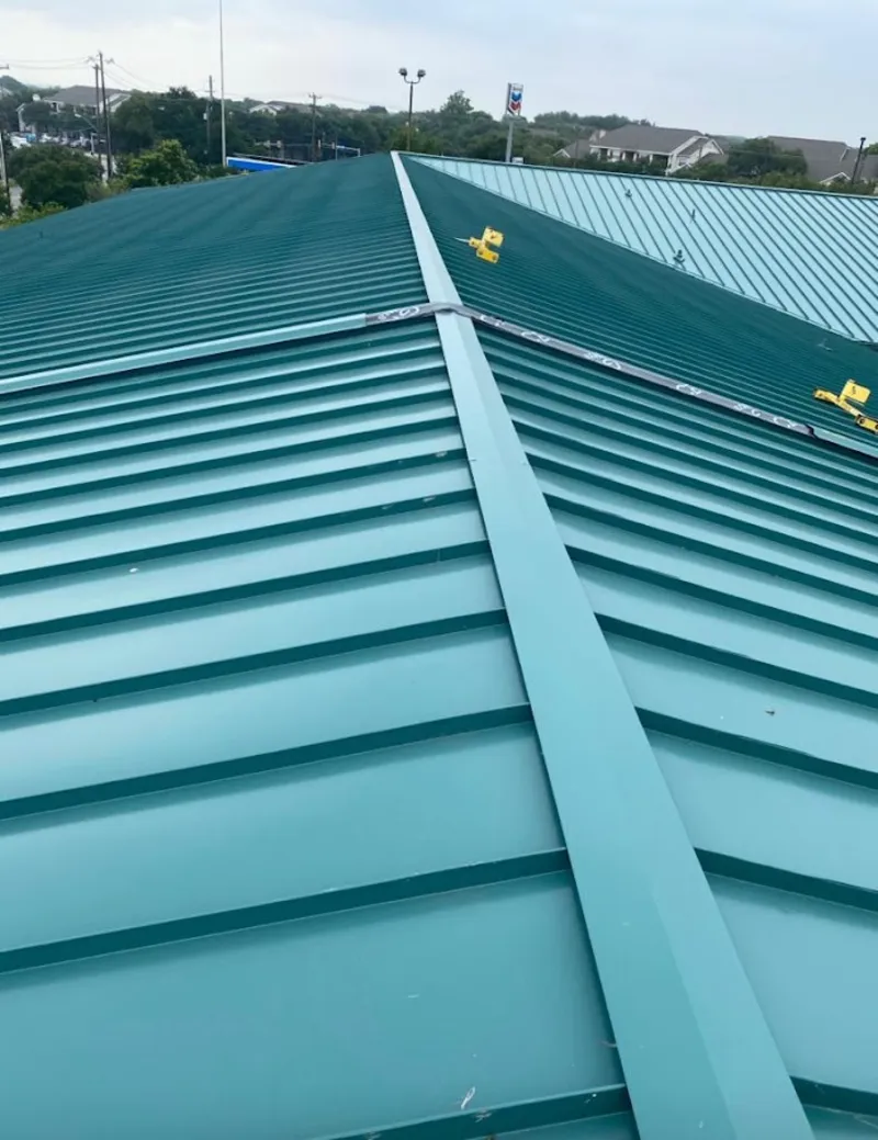Green commercial metal roof ridge and valley for Metal Roof Repair in Doctor Phillips